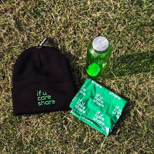 Black beanie, green bottle, and green packaging on grass with 'if u care share' text.